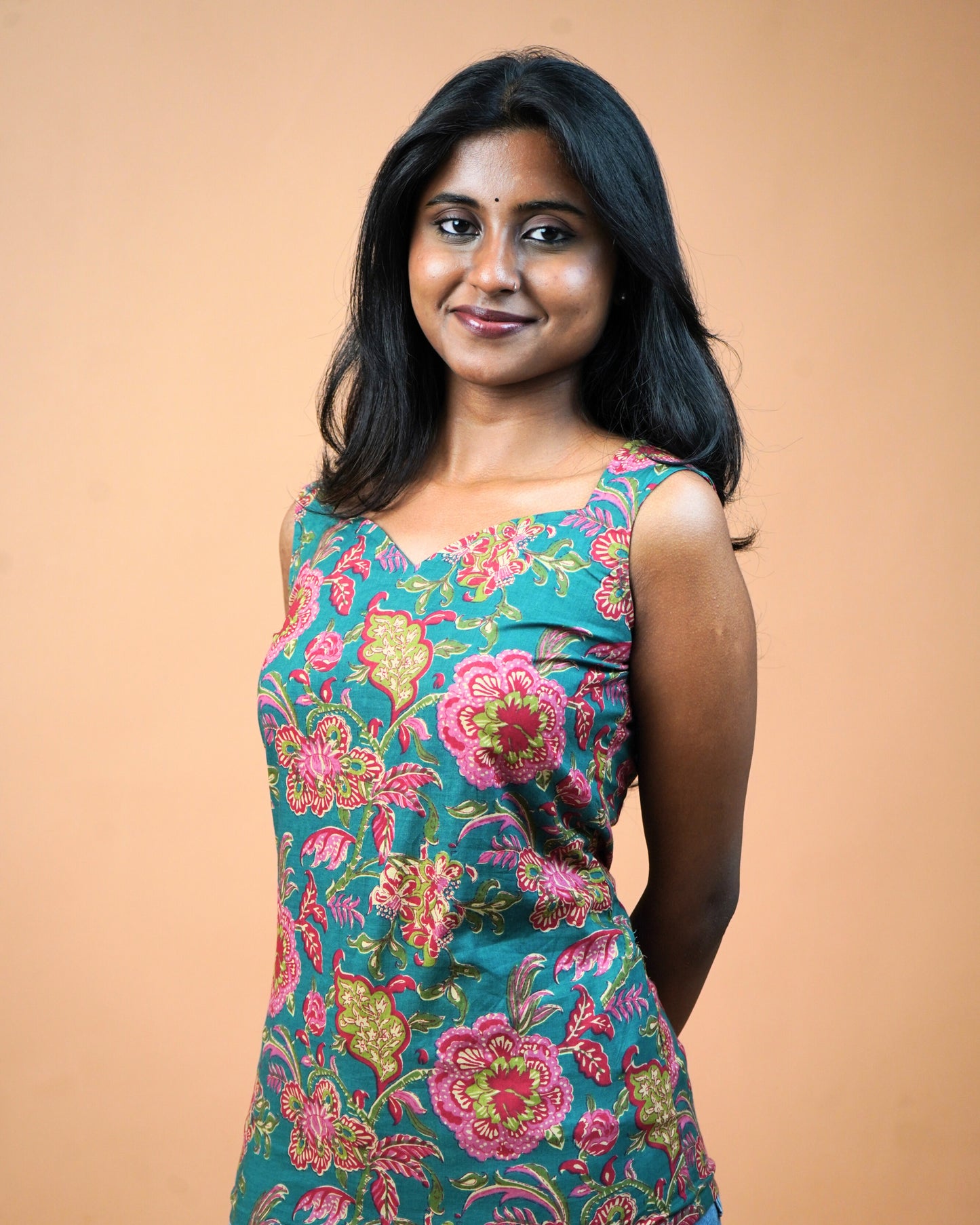 Azure Bloom – Sleeveless Dark Green Floral Cotton Short Kurti